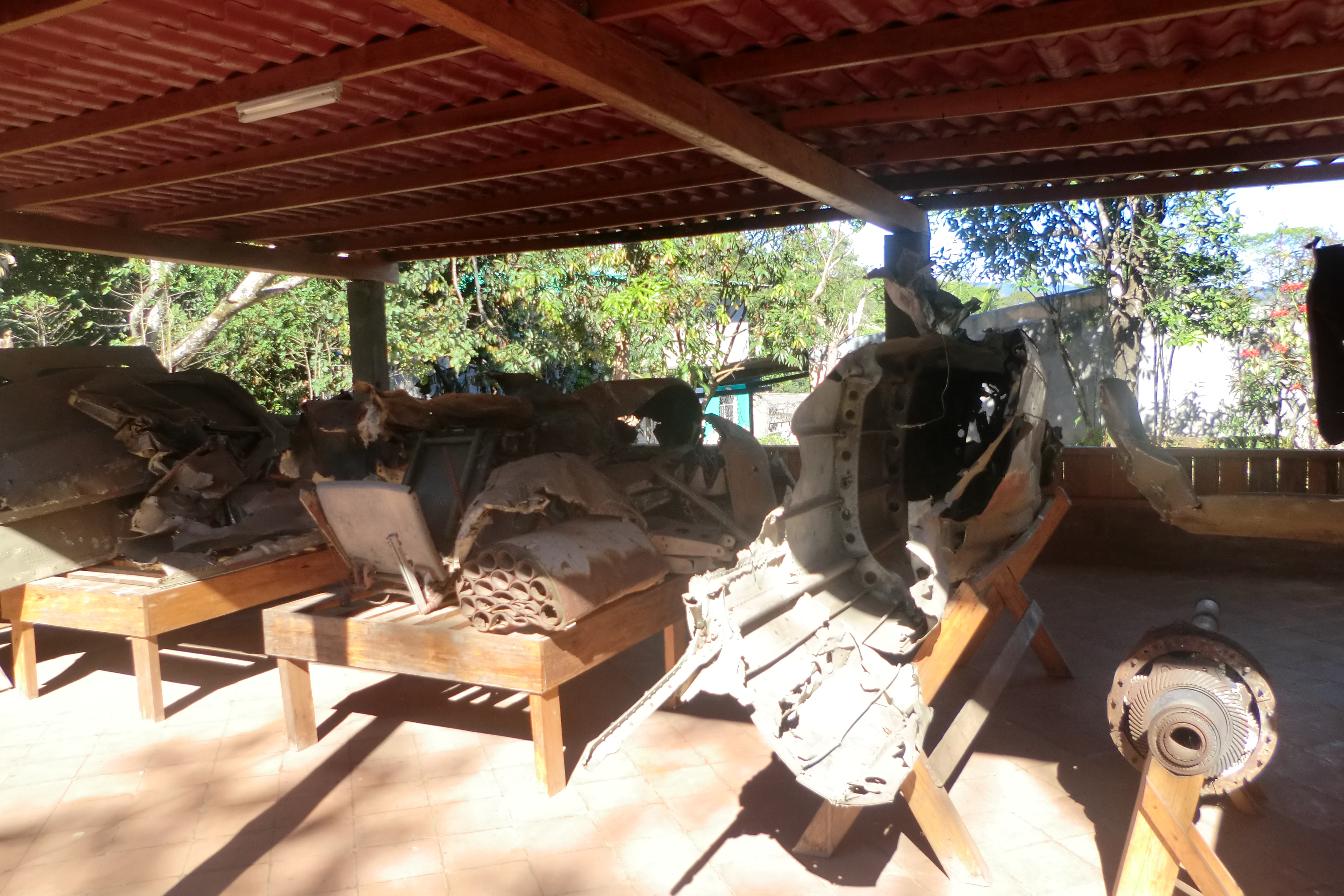 The remains of the helicopter whose shootdown (or sabotage) killed Domingo Monterossa—the Armed Forces of El Salvador commander responsible for the infamous 1981 El Mozote Massacre—at the Museo de la Revolución. Photo: Paula Ayala.
