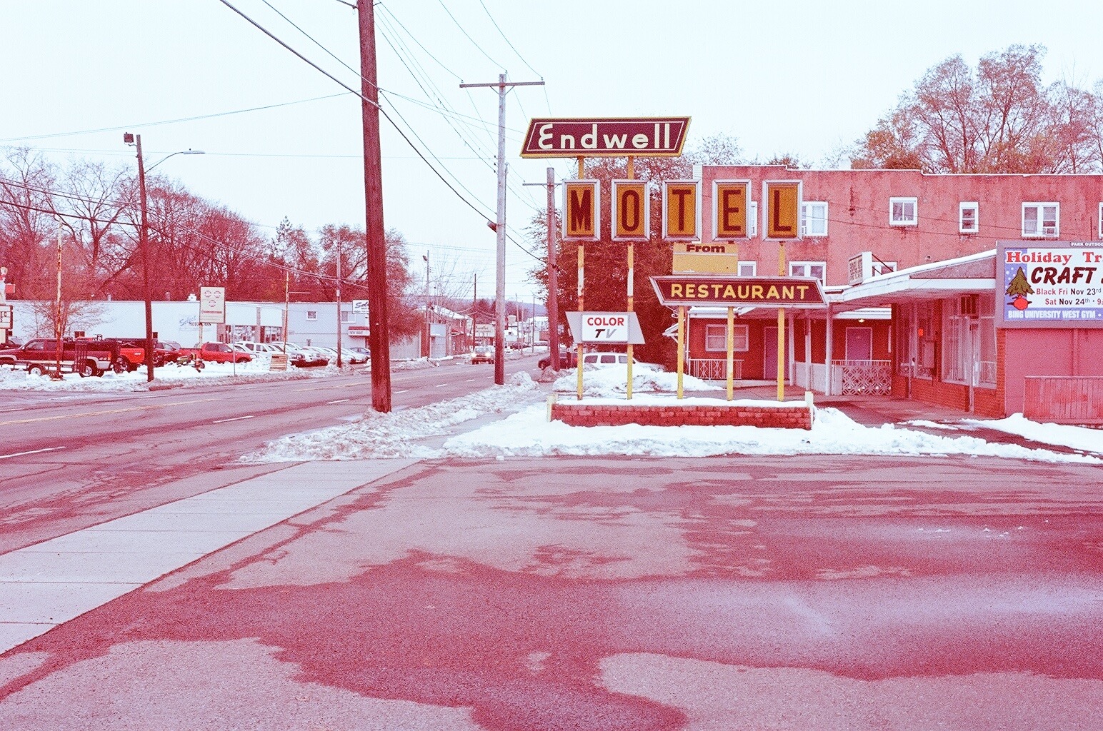 A motel parking lot.