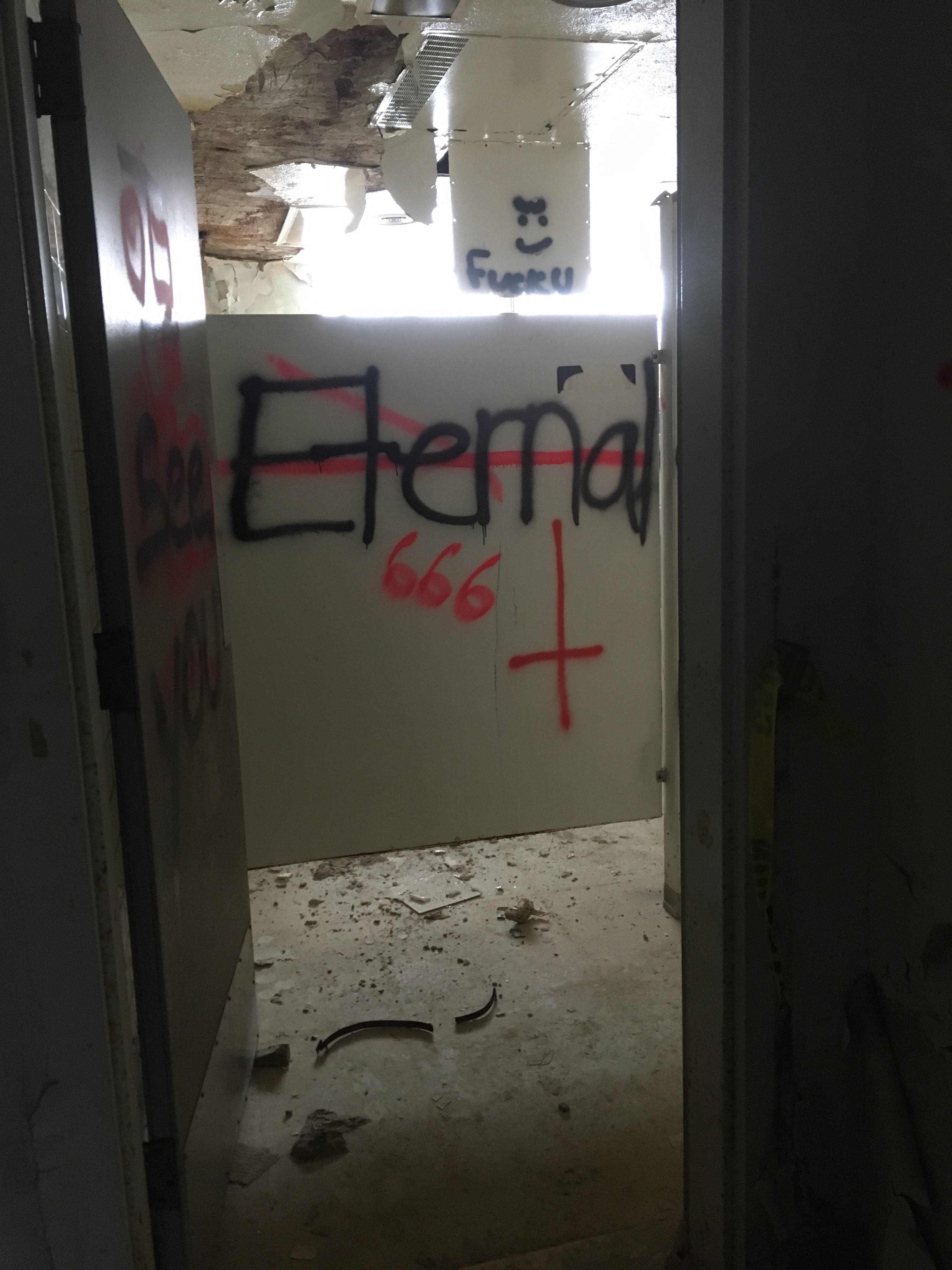 A graffitied bathroom.